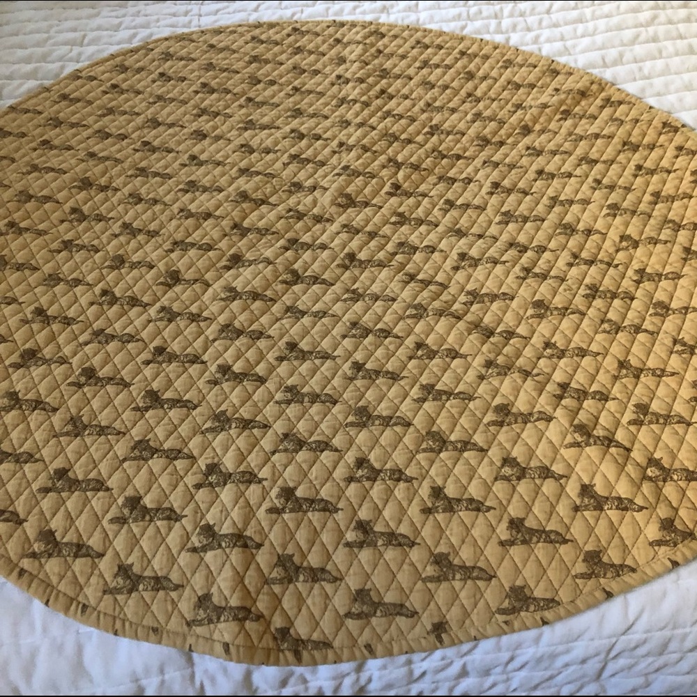 Kate Quinn | quilted round tiger quilt